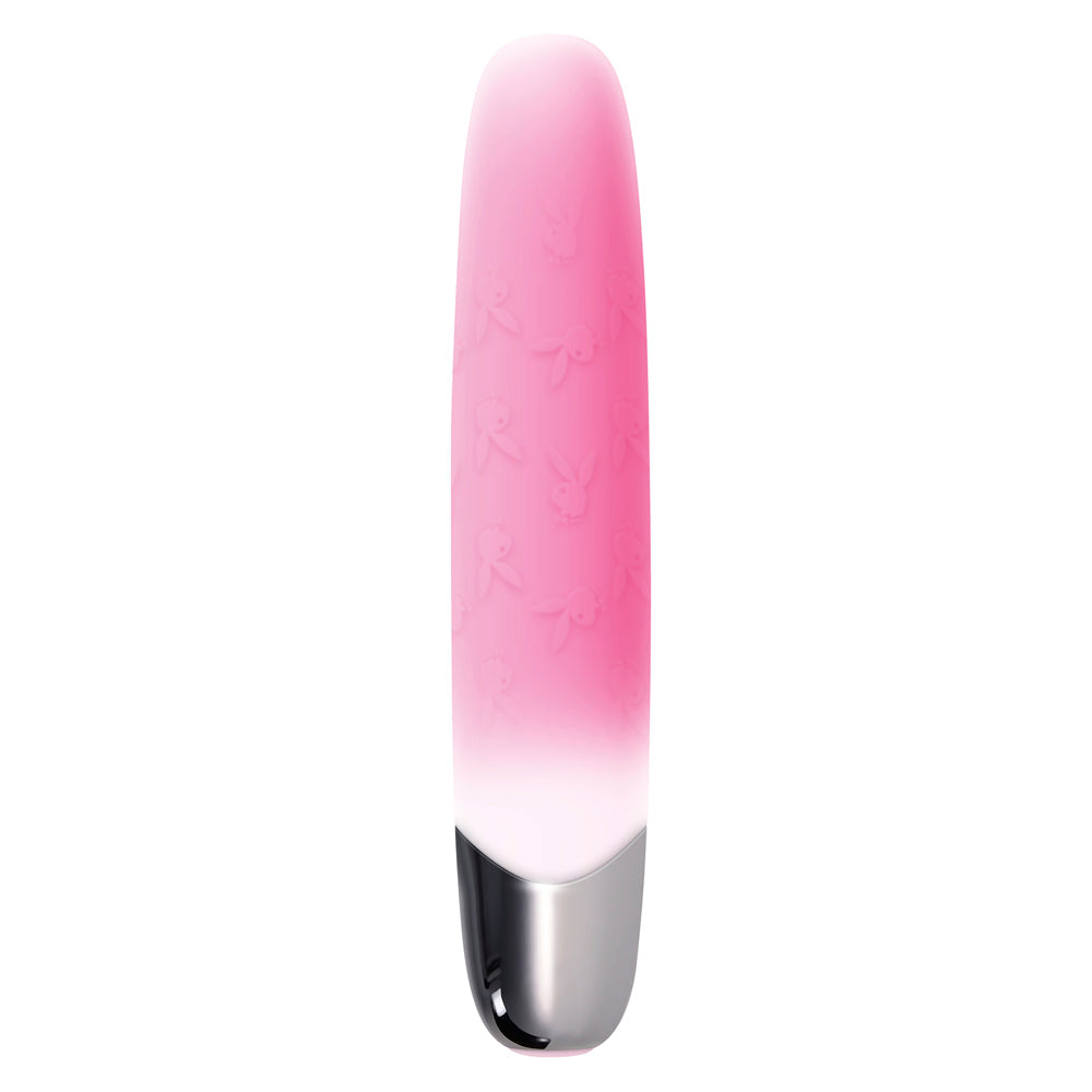 Pink silicone bullet vibrator with Playboy bunny pattern.