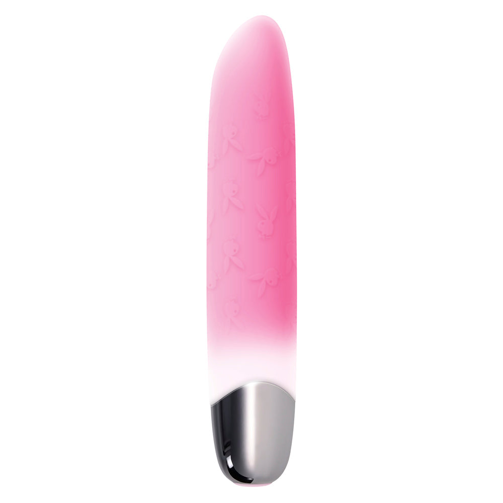 Pink silicone bullet vibrator with Playboy bunny pattern and silver base.