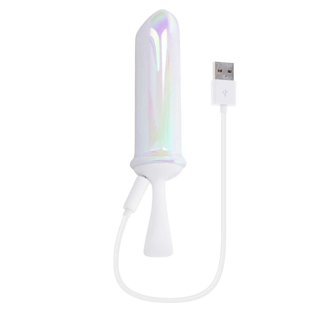 A pearlescent bullet vibrator with a white base and USB charging cable.