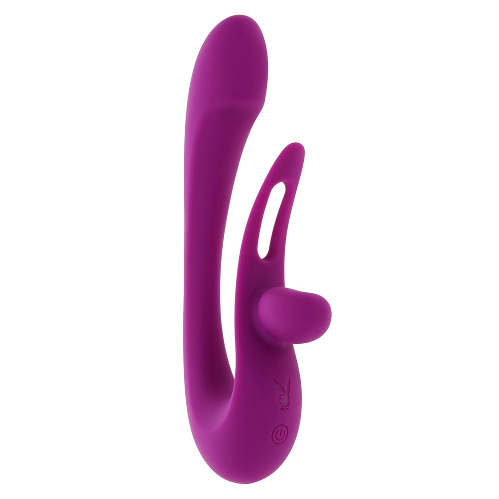 Purple dual silicone vibrator with a curved design and a small nub.