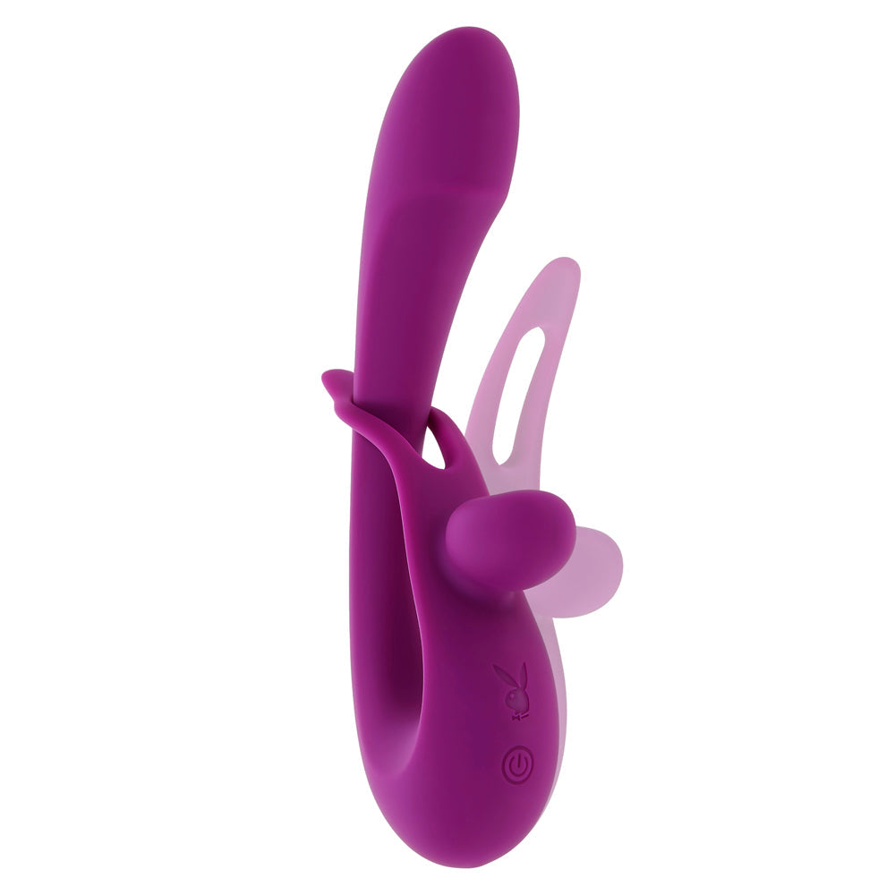 Purple dual silicone vibrator with bunny ears and power button.