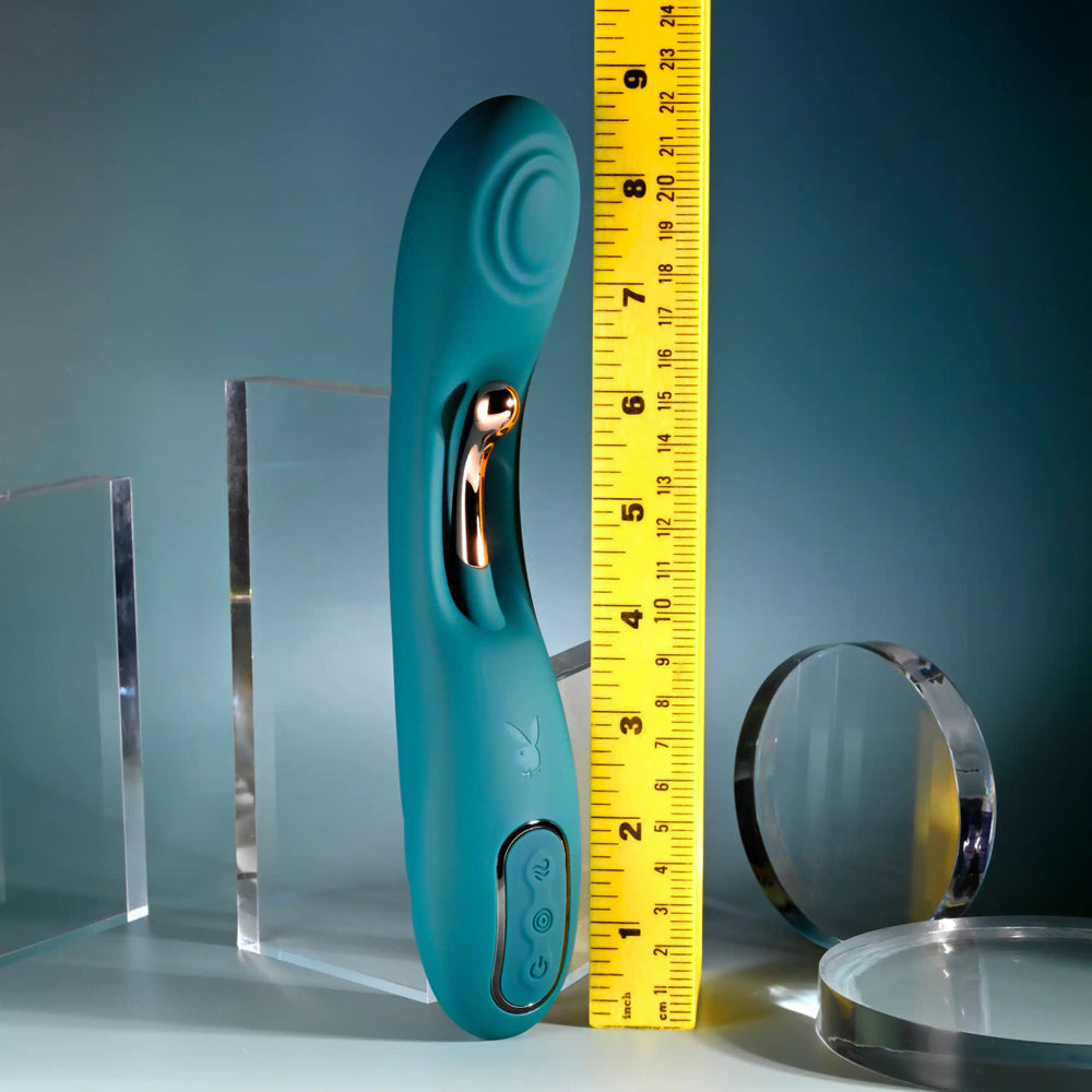 Teal Aurelie G-spot vibrator with gold accent, shown next to a ruler.