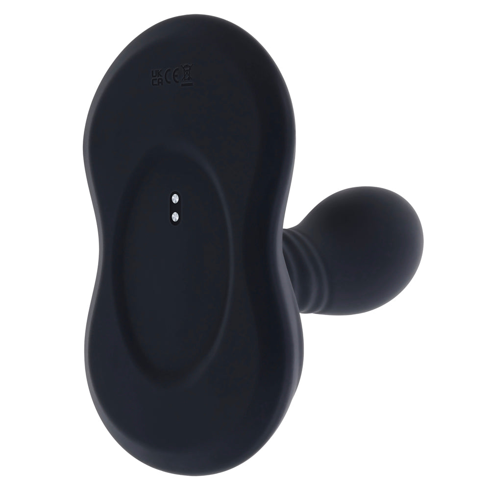 Black rotating vibe with two charging pins and UK CA CE markings.