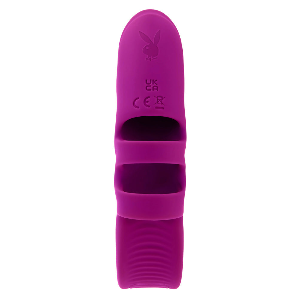 A purple finger vibrator with a Playboy bunny logo and CE marking.