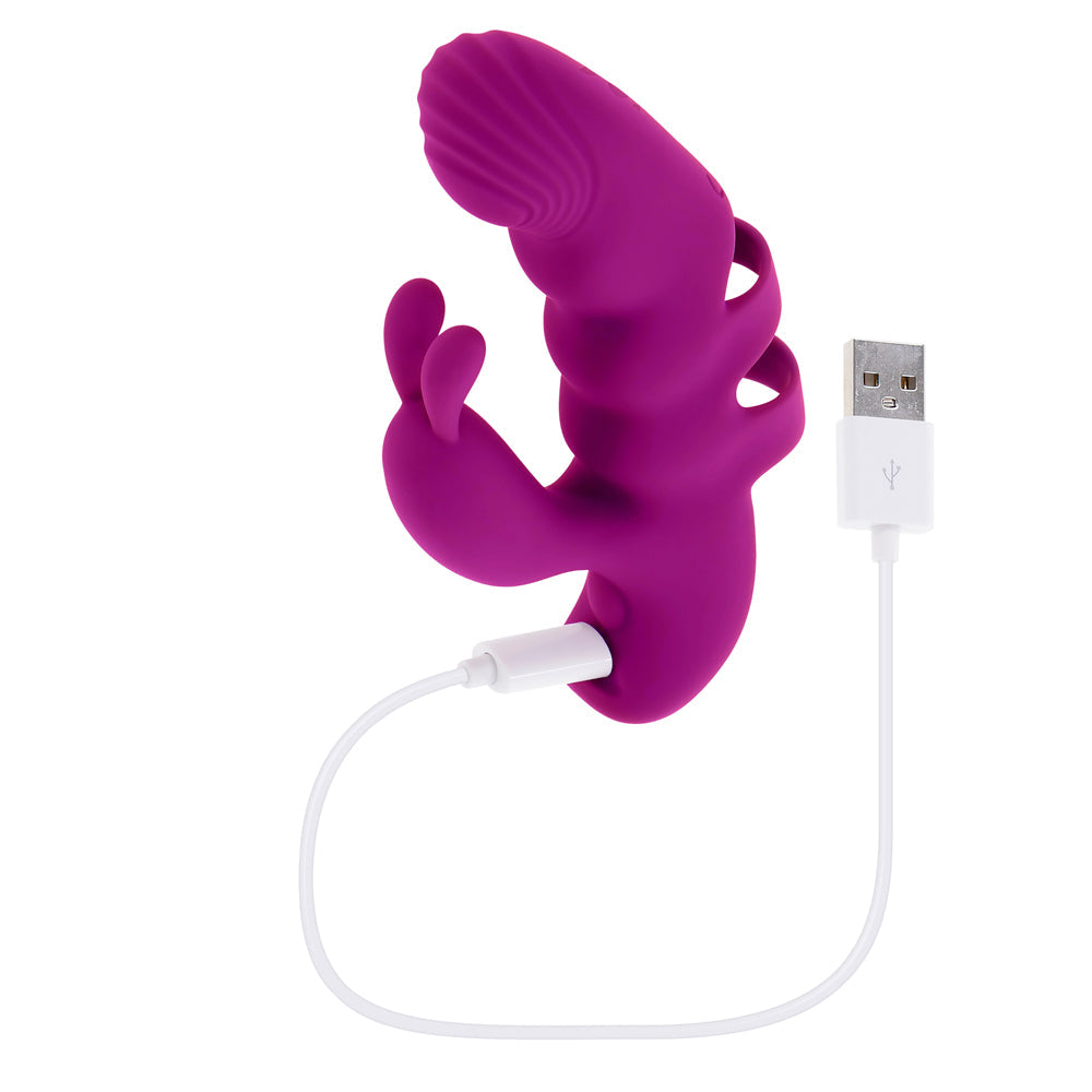 A purple G-spot finger vibrator with a USB charging cable.