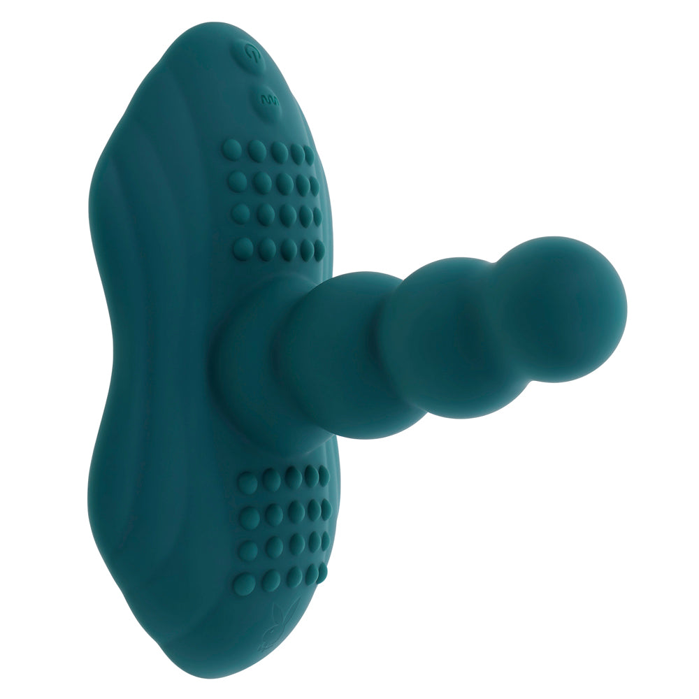 Teal silicone massager with textured surface and beaded probe.