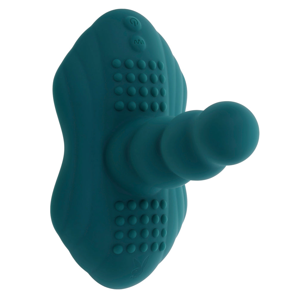 Teal silicone massager with textured surface and ribbed probe.
