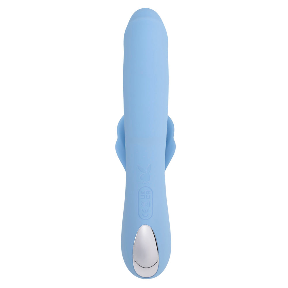 A light blue vibrator with a silver button at the base.