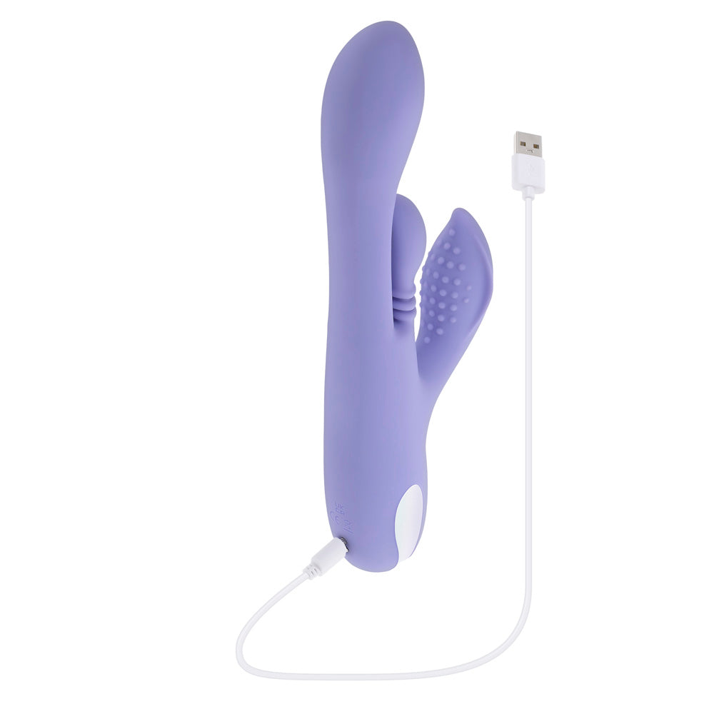 A purple silicone vibrator with a USB charging cable.