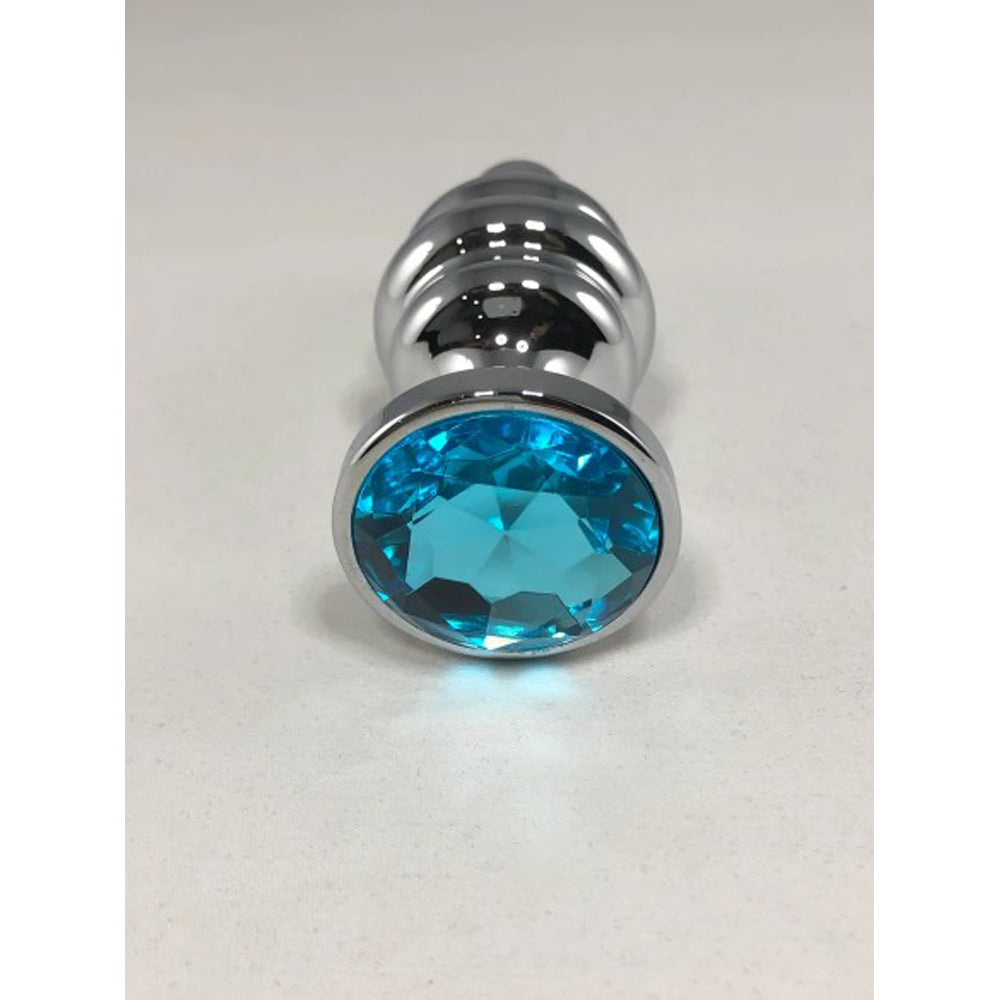 Large stainless steel threaded anal plug with a blue gem.