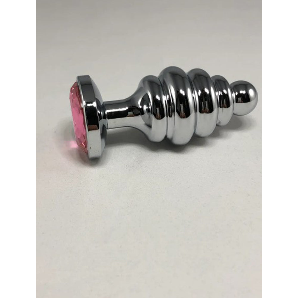 Large stainless steel threaded anal plug with a pink gem.