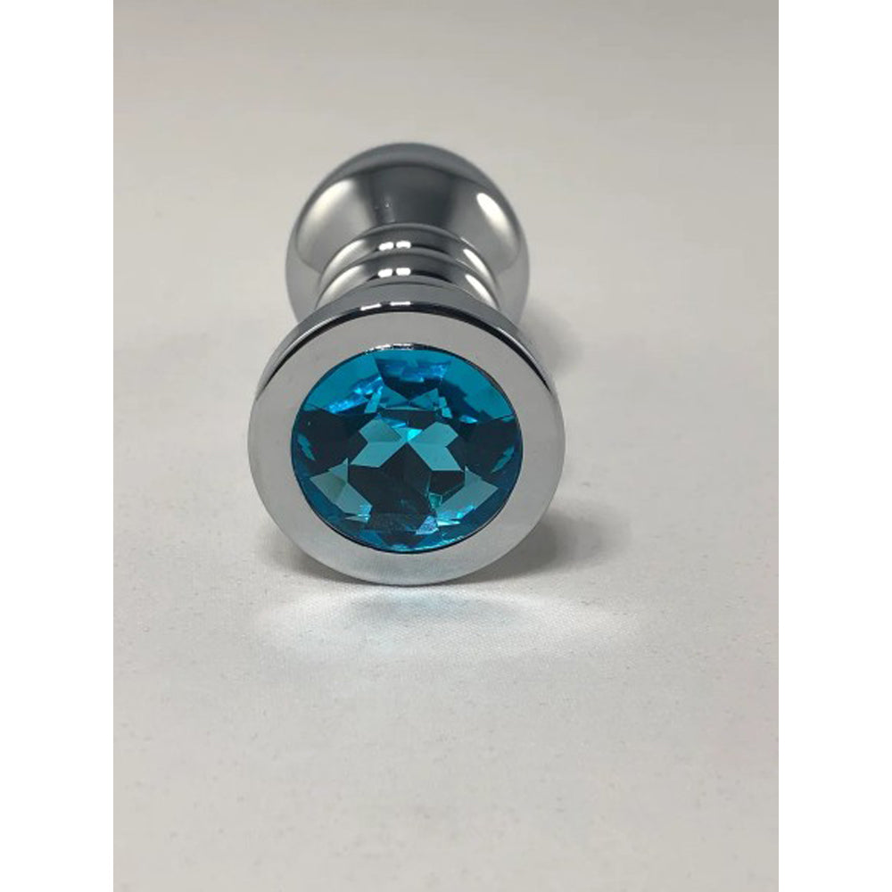 Large stainless steel anal plug with a blue gem.