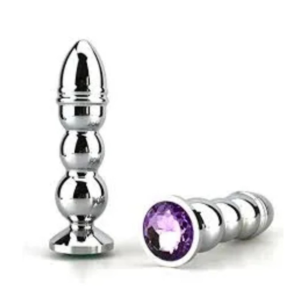Silver anal plug with a tapered top and a purple gem base.