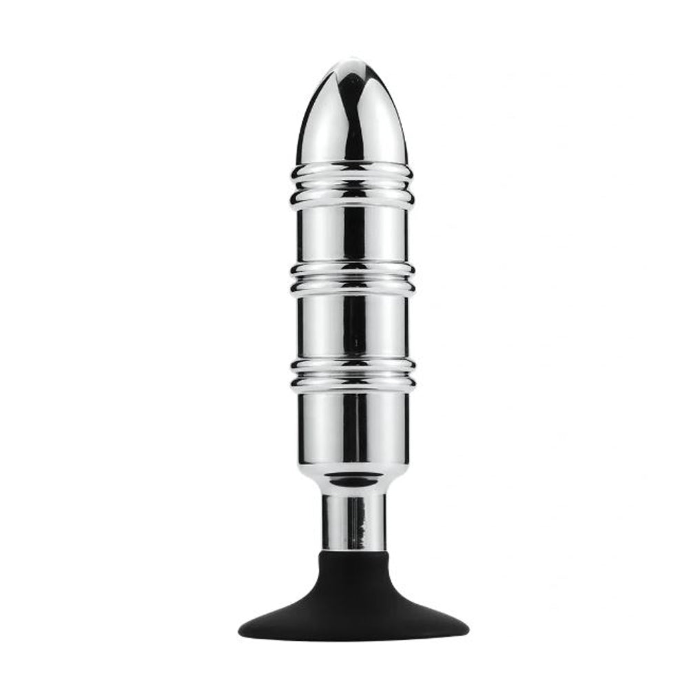 Stainless steel anal plug with a pointed tip, ribbed body, and black suction cup base.