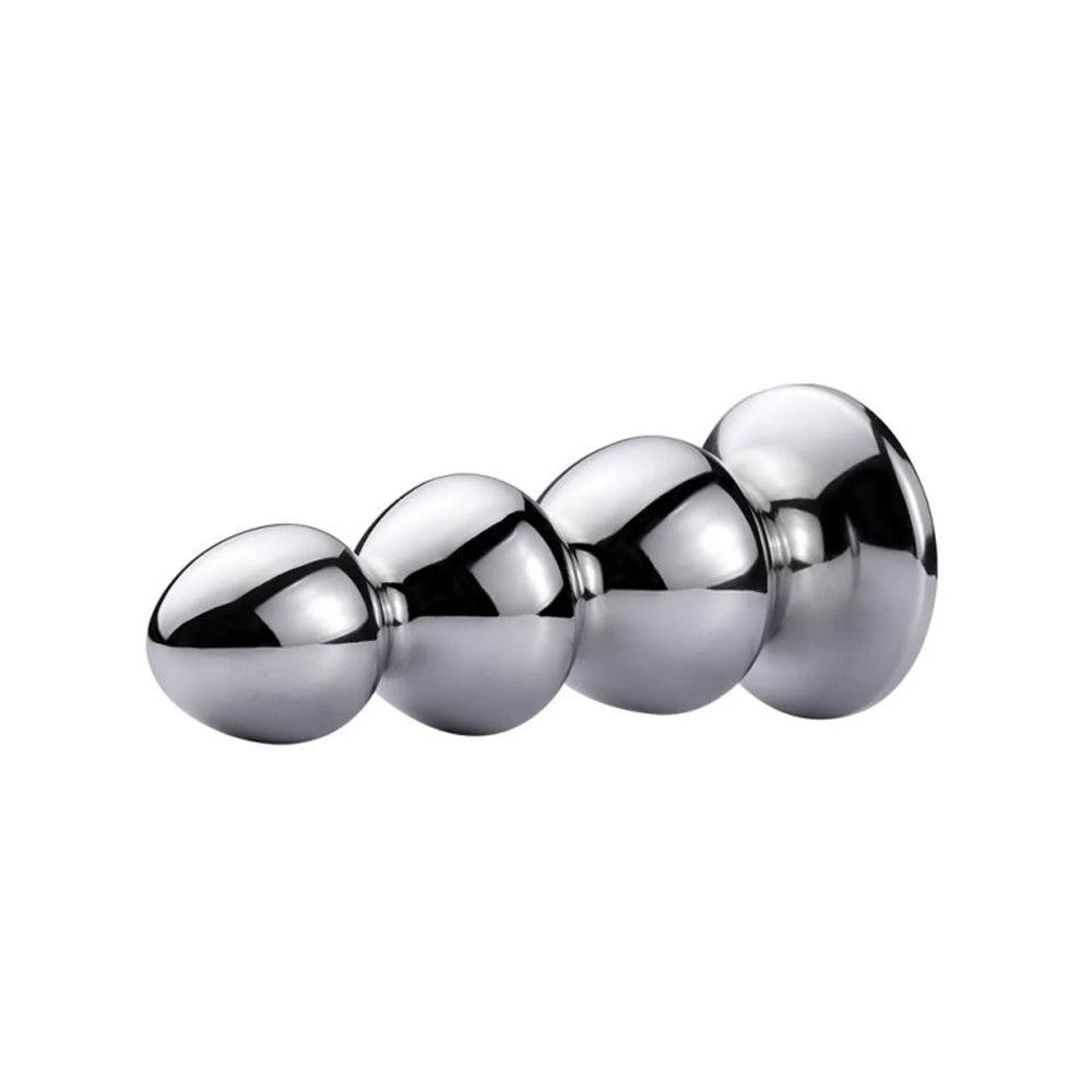 A stainless steel anal plug with four graduated beads.