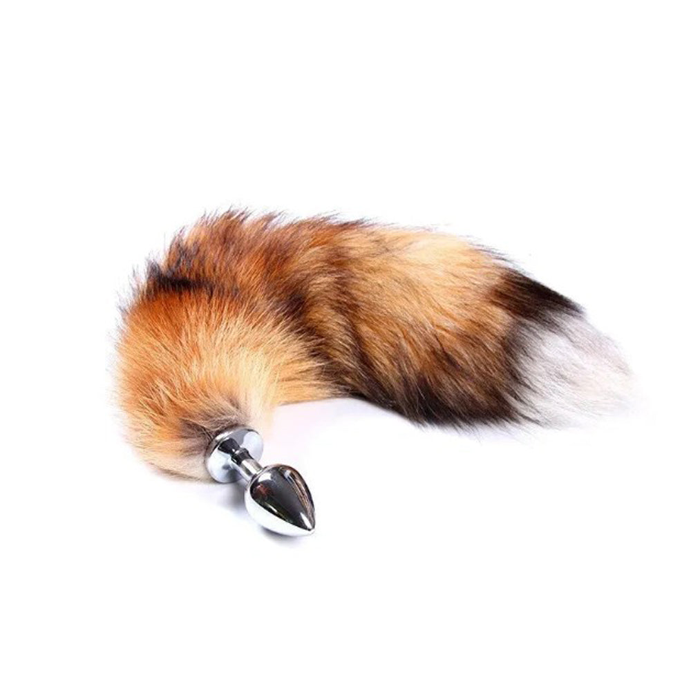 Small stainless steel fox tail anal plug in brown.