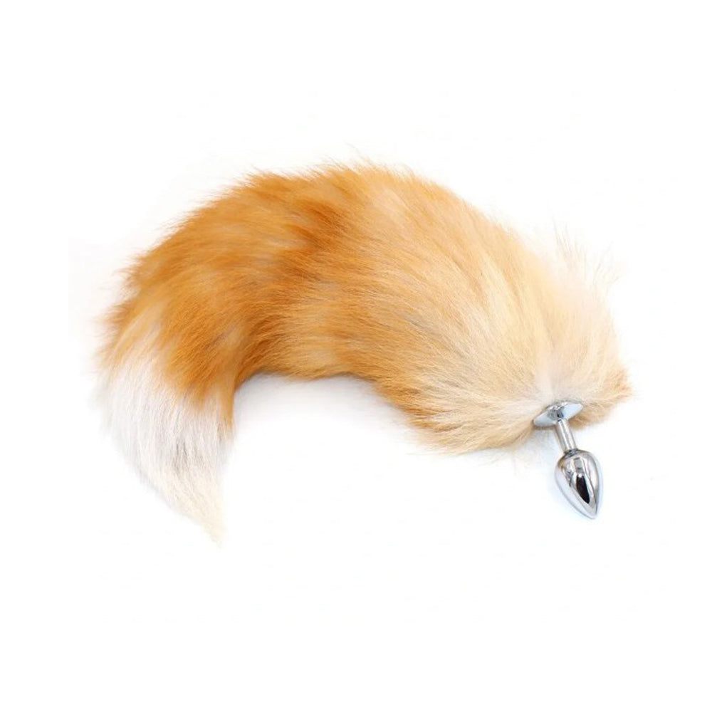 Small stainless steel fox tail anal plug in blond.