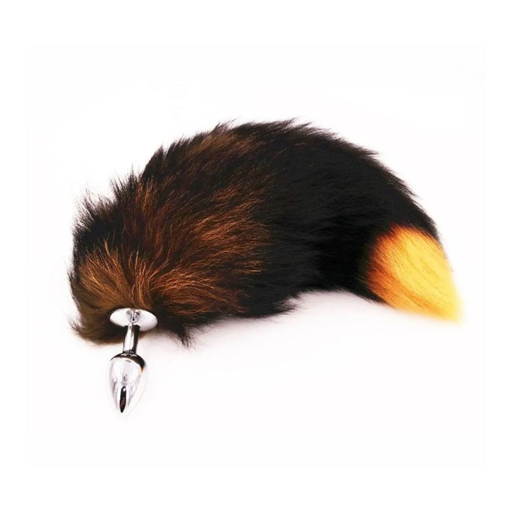 Small stainless steel anal plug with a fluffy fox tail in black, brown, and orange.