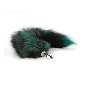 Small teal fox tail anal plug with stainless steel base.