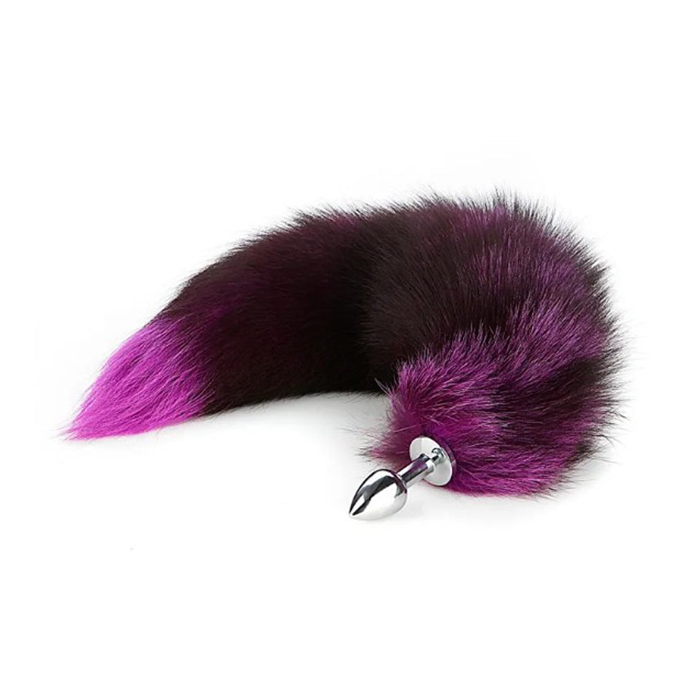 A large purple fox tail anal plug with a stainless steel base.