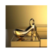 Gold plated stainless steel prostate massager with a curved shape and a loop at one end.