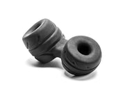 Black SilaSkin cock ring and ball stretcher with textured rings.