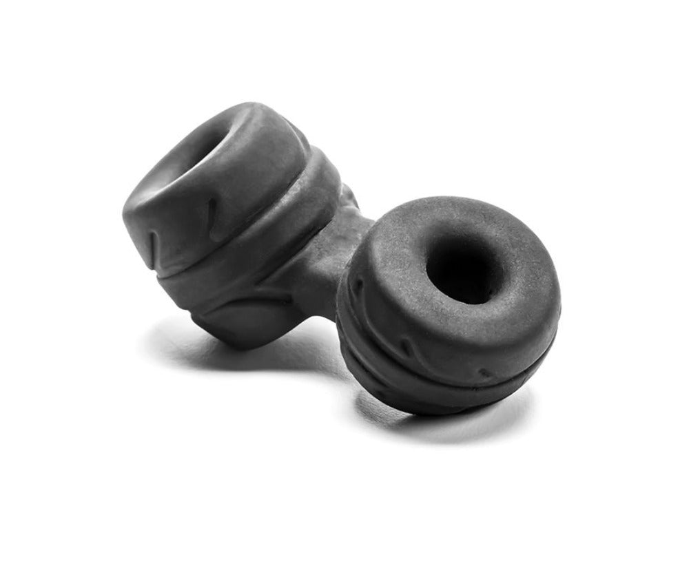 Black SilaSkin cock ring and ball stretcher with textured rings.