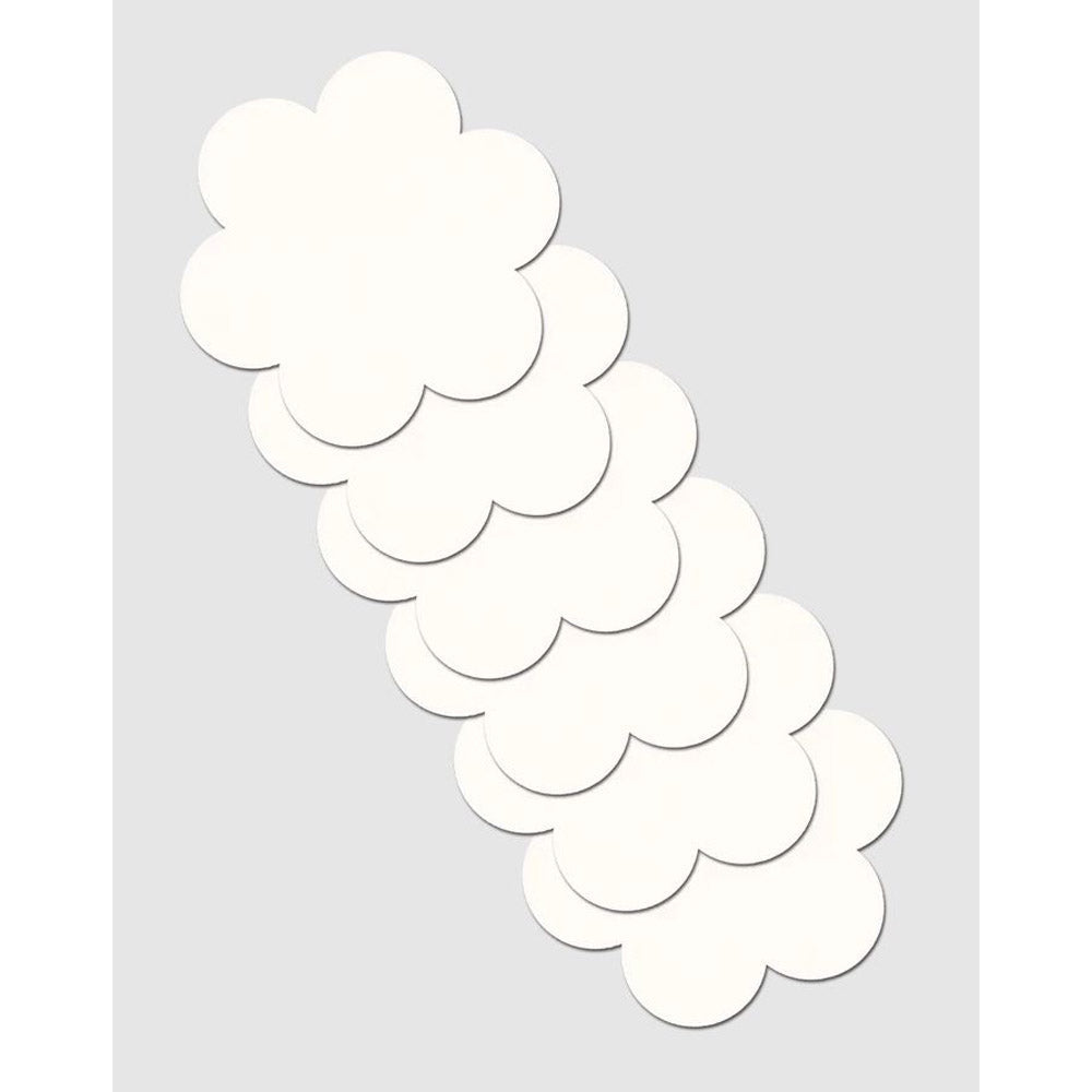 White daisy-shaped pastie refills in a stack.