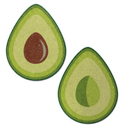 Two green avocado halves, one with a brown pit, on a white background.