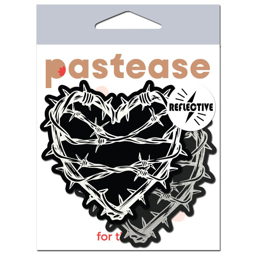Reflective barbed wire heart pasties with "pastease" logo.