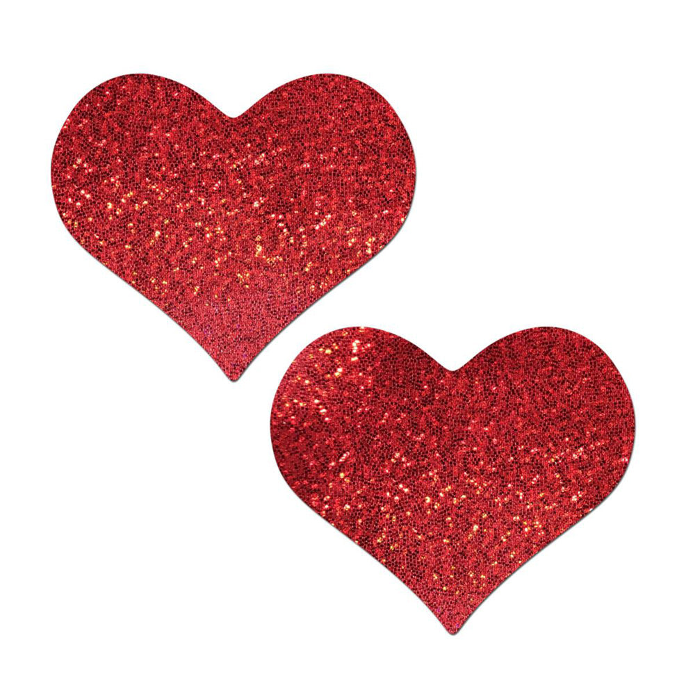 Two red glitter heart pasties on a white background.