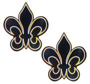 Two black fleur-de-lis nipple pasties with gold and white trim.