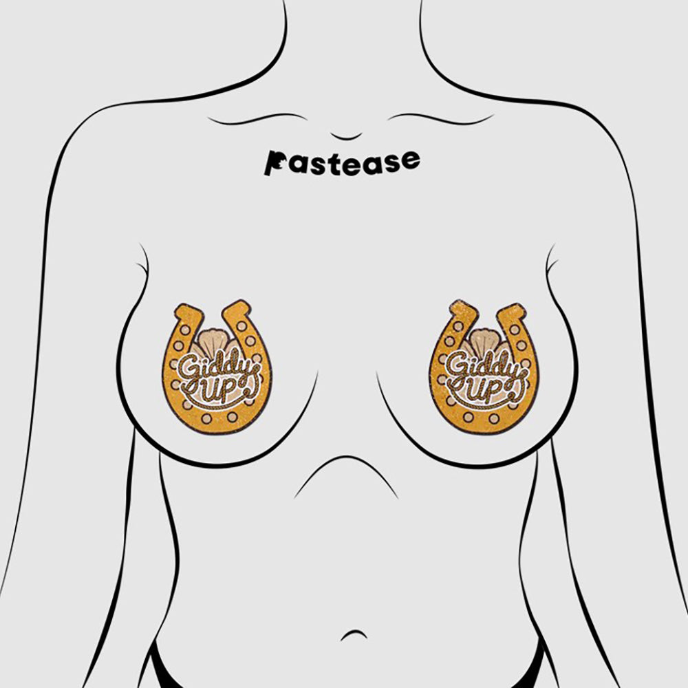 Golden horseshoe nipple pasties with "Giddy Up" text.