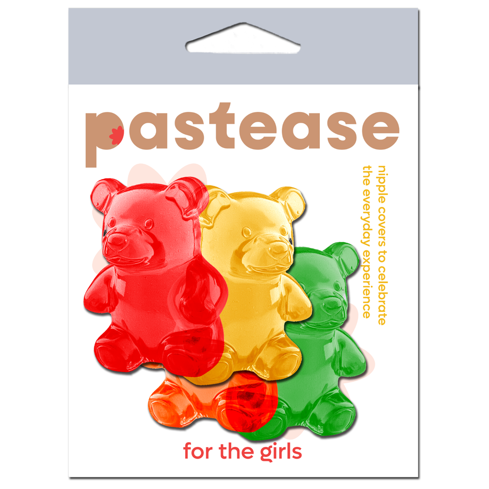 Three gummy bear shaped nipple covers in red, yellow, and green.