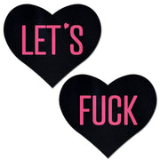 Black heart nipple pasties with pink "Let's Fuck" text.
