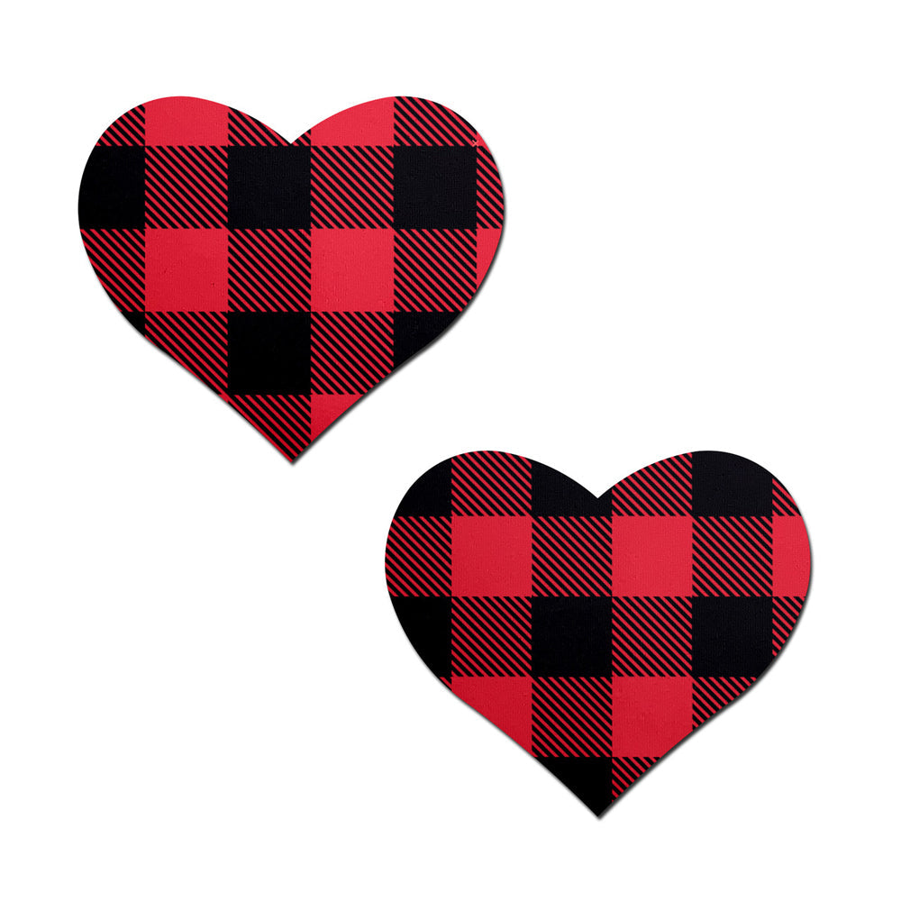 Two red and black buffalo plaid heart-shaped nipple pasties.