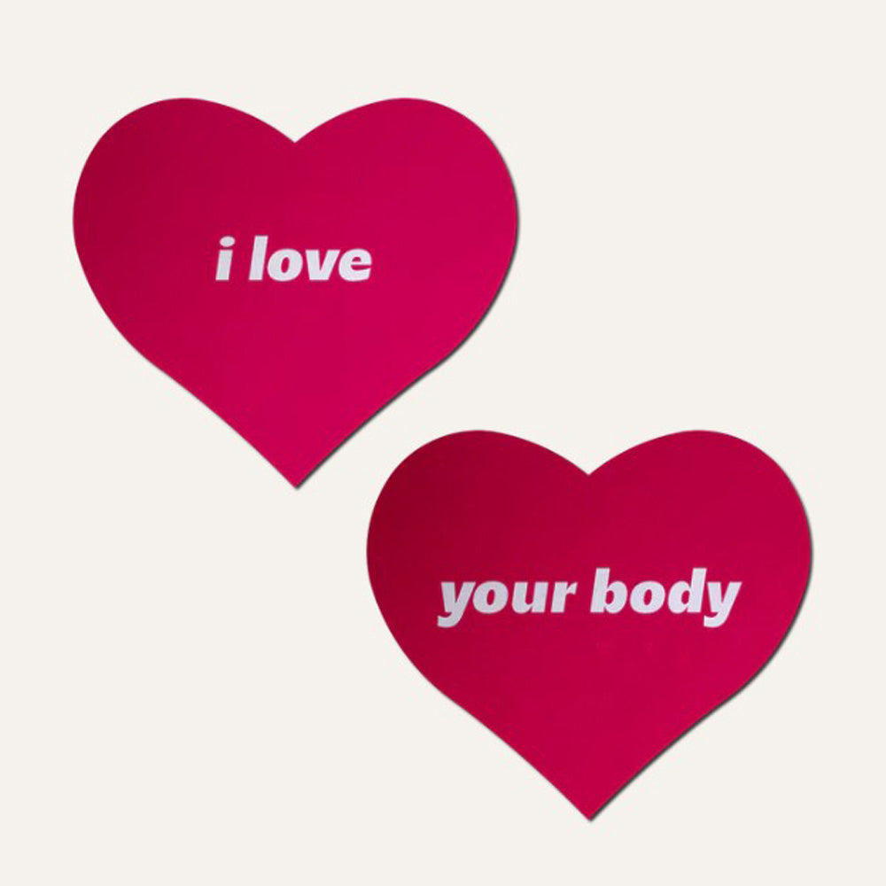 Pink heart nipple pasties with "i love your body" text.
