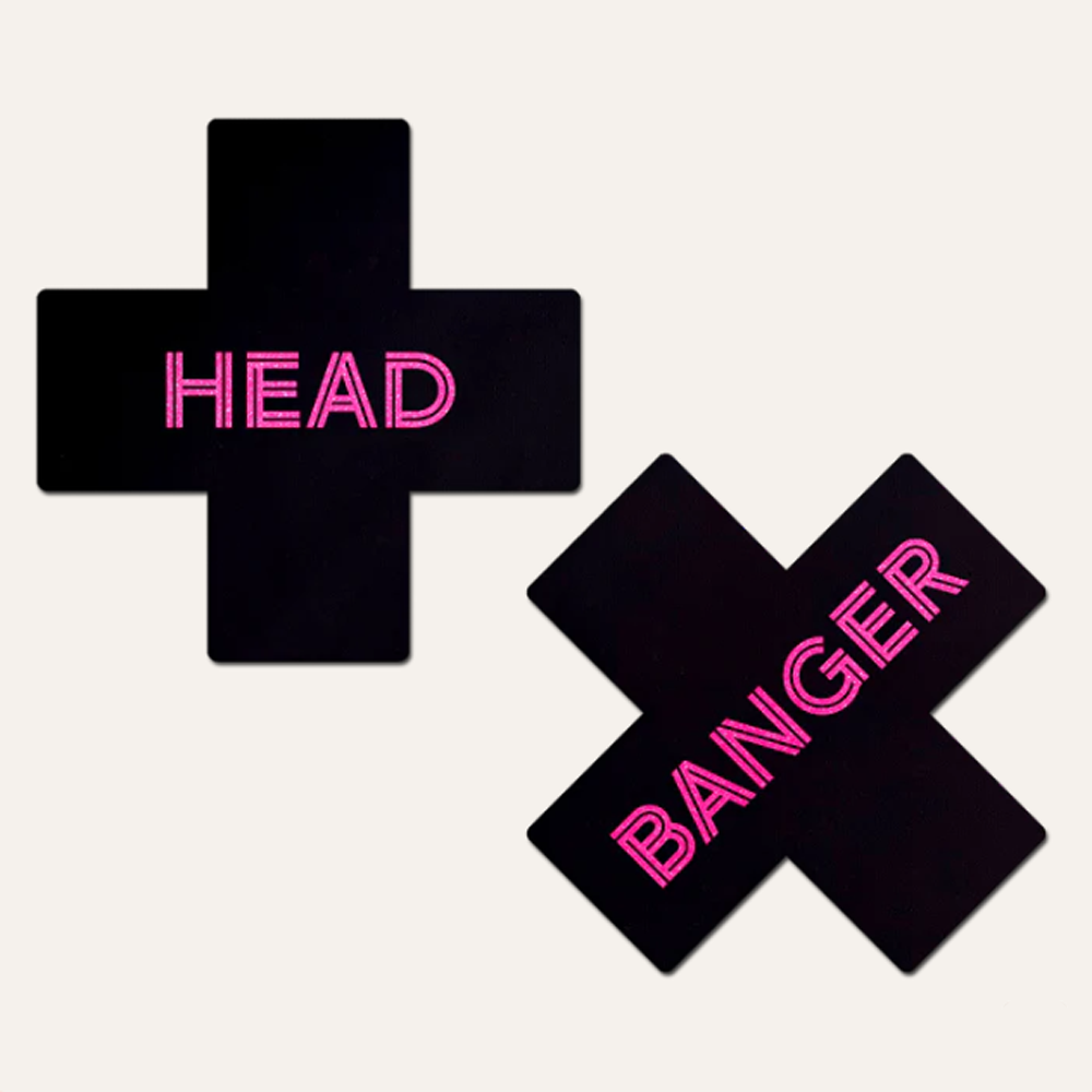 Neon pink cross-shaped nipple pasties with "HEAD" and "BANGER" text.