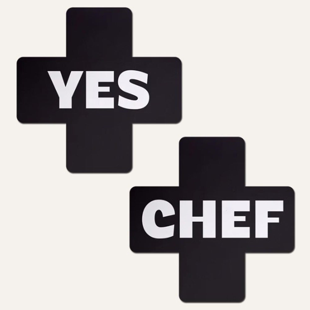 Black cross-shaped nipple covers with "YES" and "CHEF" in white text.