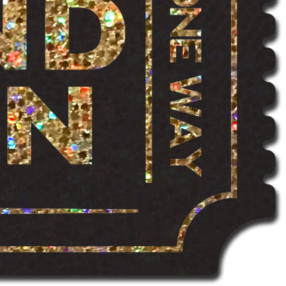 Gold glitter ticket nipple pasties with a black background.