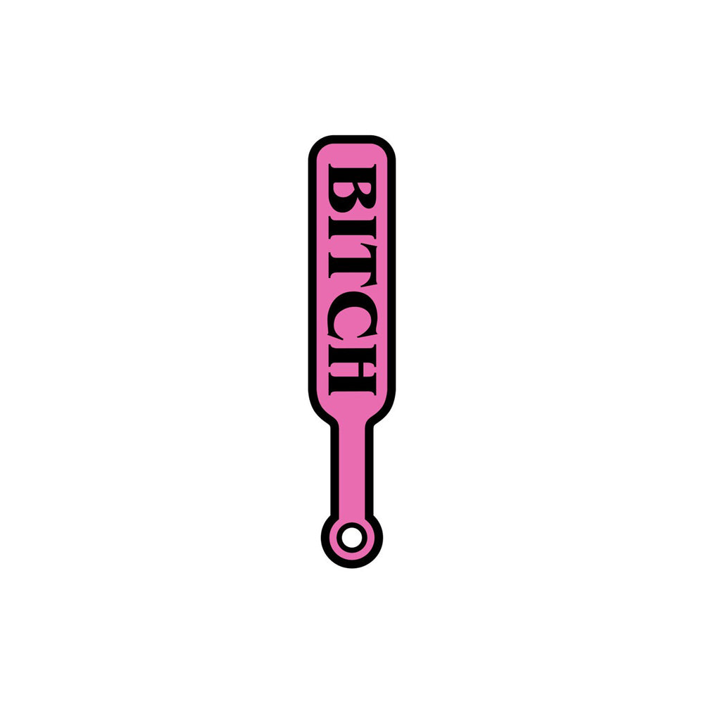 Pink and black enamel lapel pin shaped like a paddle with the word "Bitch".