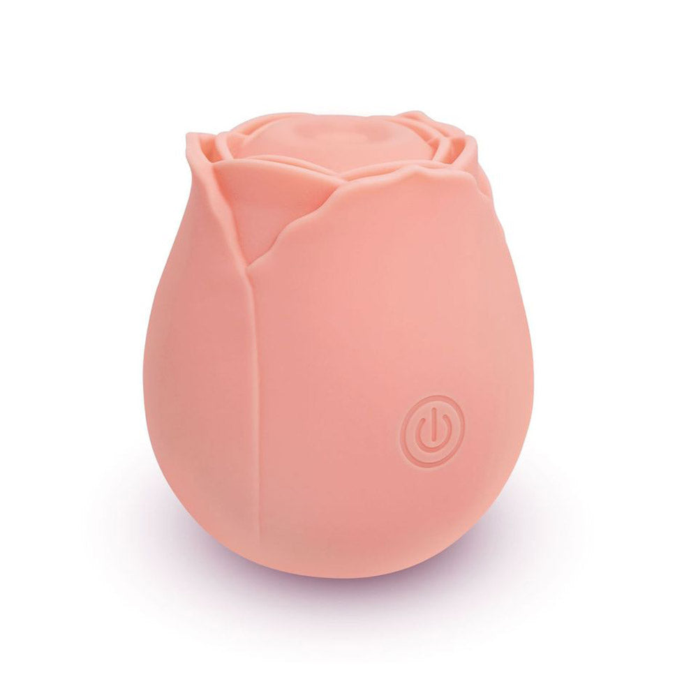 A pink silicone rose-shaped toy with a power button symbol.
