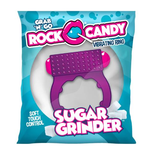 A purple vibrating ring with a textured surface on a teal bag.