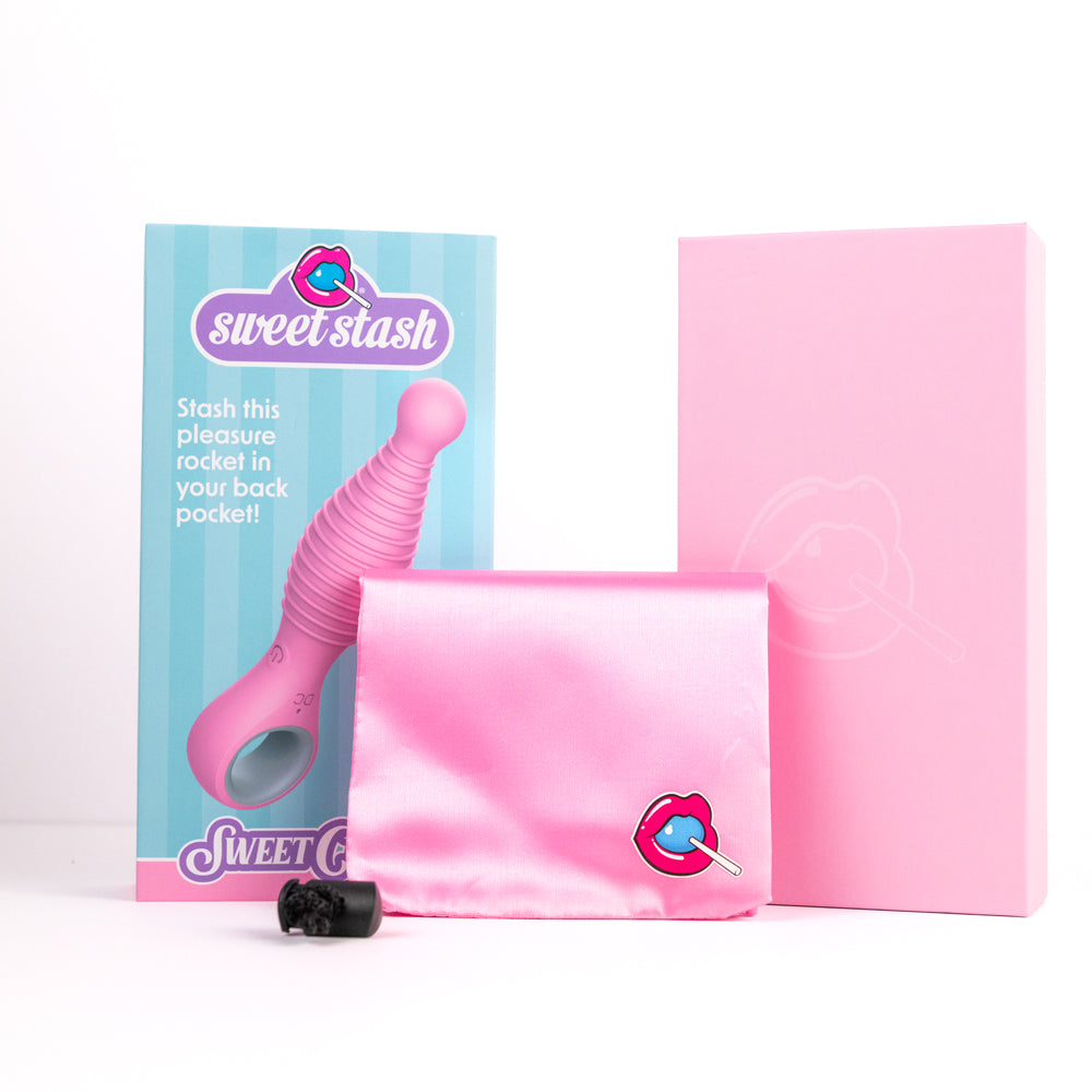 Pink ribbed vibrator with a pink pouch and box, featuring a lollipop lips logo.