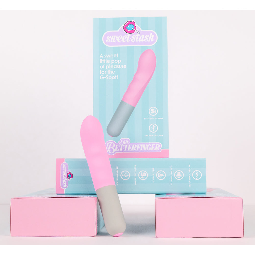 Pink and gray G-spot vibrator with packaging.