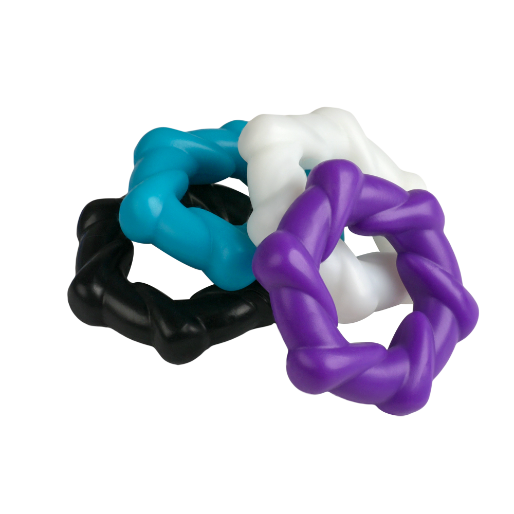 Four textured C-rings in black, blue, white, and purple.