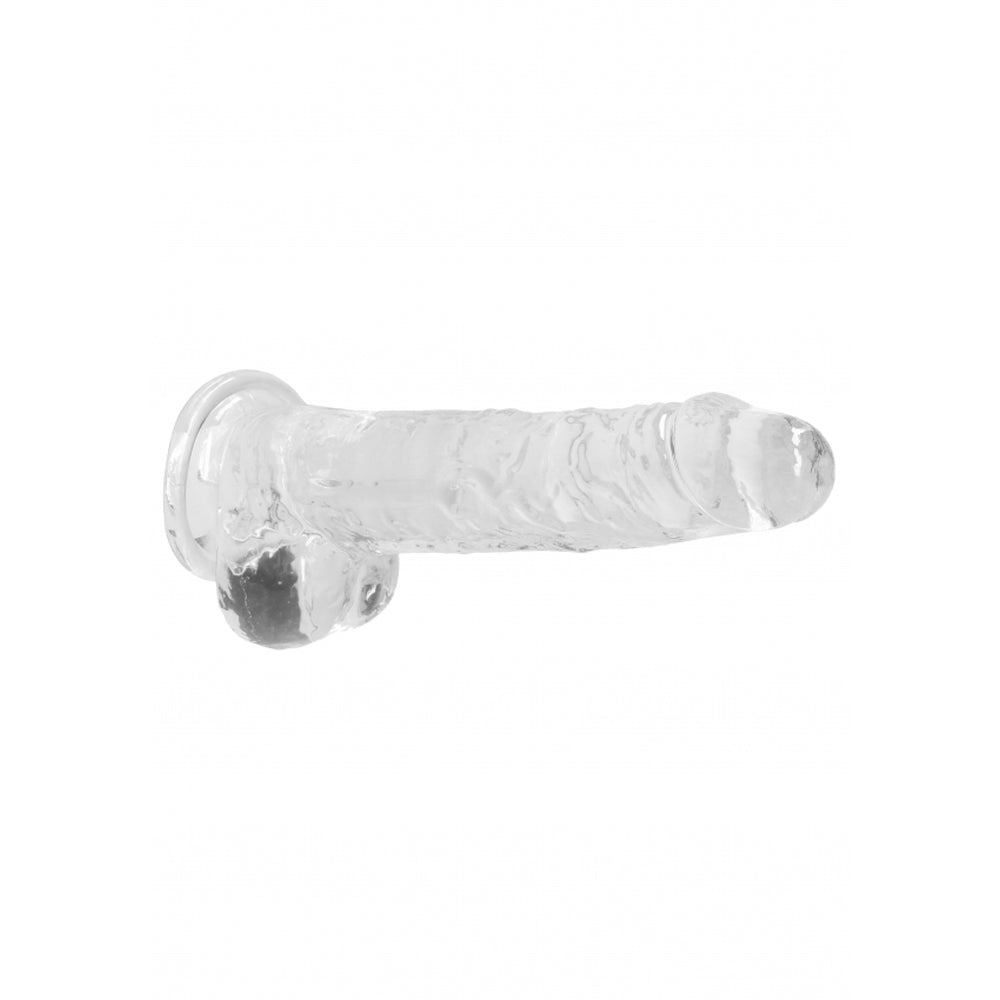 Clear suction cup dildo with textured shaft and realistic balls.