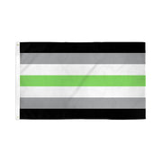 Agender pride flag with black, gray, white, and green stripes.