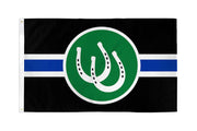 A flag with black background, a blue stripe, and a green circle with two white horseshoes.