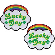 Two rainbow and cloud shaped nipple pasties with "Lucky Day" text.